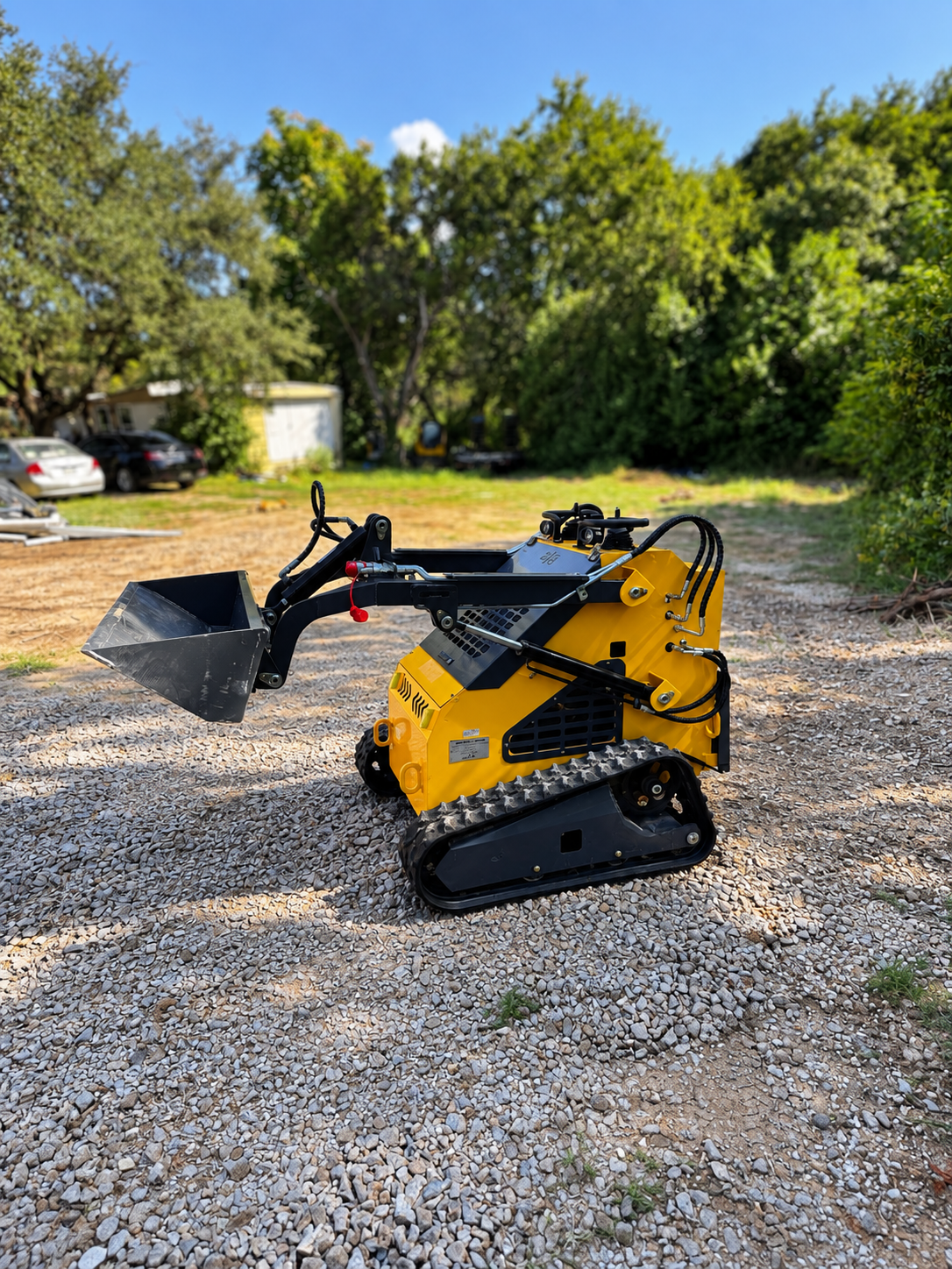 ZJ-380 mini skid steer in yard